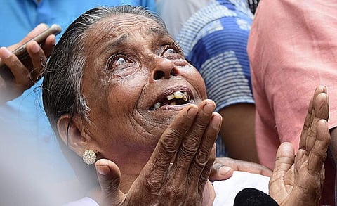 Udayakumar's mother breaks down before the media outside the court after the CBI Special Court pronounced six policemen guilty of murdering her son while he was in police custody. ( Photo | B P Deepu / EPS)