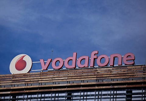 The Vodafone logo can be seen on top of a building outside Madrid, Spain, April 13, 2016. (File | Reuters)