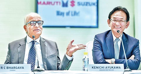 Maruti Suzuki India Chairman R C Bhargava with CEO Kenichi Ayukawa. ( Photo  | PTI )
