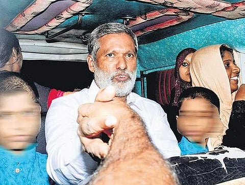 Abdul Latheef and his wife Lekha being taken to the Child Welfare Committee office along with children from their house at Mannanam, North Paravur, on Tuesday | A Sanesh