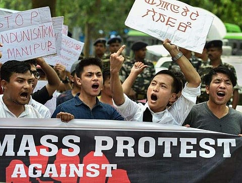 Manipur University Student's Union raise slogans demanding the removal of Vice Chancellor Adya Prasad Pandey, in New Delhi on July 18, 2018. | PTI
