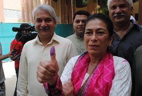 Voters at the poll booth. (Photo | AP)
