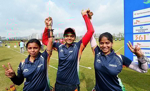 Bronze medal winning Women's compound archery team members Jyothi Surekha Vennam, Purvasha Sudhir Shende and Trisha Deb pose after the final at the 17th Asian Games in Incheon. (File | PTI)