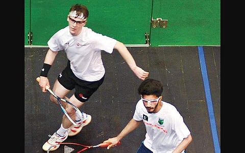 England’s Nicholas Wall (left) and Pakistan’s Abbas Zeb in action during the World Junior Squash Championships at Express Avenue on Friday. (D Sampathkumar | EPS)