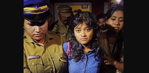 Hanan Hamid being moved away from a crowd at Kochi. (Photo |PTI)