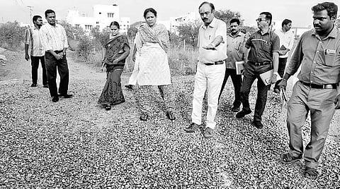 Perambalur Collector V Shantha inspecting the progress of road construction | Express