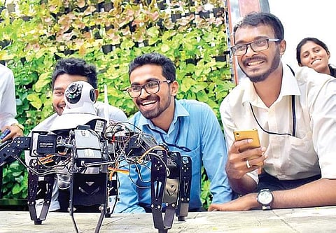 Students of Sapthagiri College of Engineering who designed the six-legged robot, interact with the media on Monday | Pandarinath B