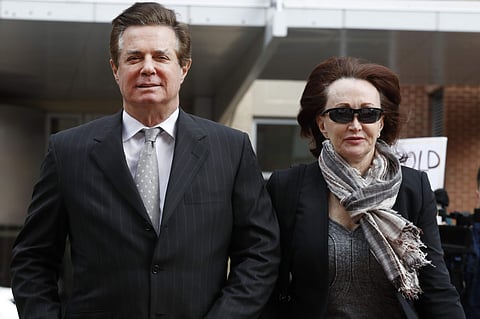 Paul Manafort, left, President Donald Trump's former campaign chairman, walks with this wife Kathleen Manafort, as they arrive at the Alexandria Federal Courthouse in Alexandria, Va. Jury selection is set to begin in the trial of President Donald Trump’s 