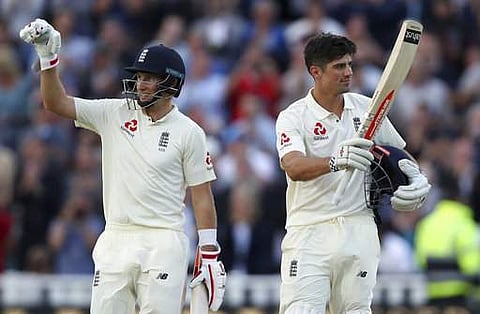 England's Alastair Cook, right, with Joe Root during day one of the first day-night Test match at Edgbaston. (File | AP)