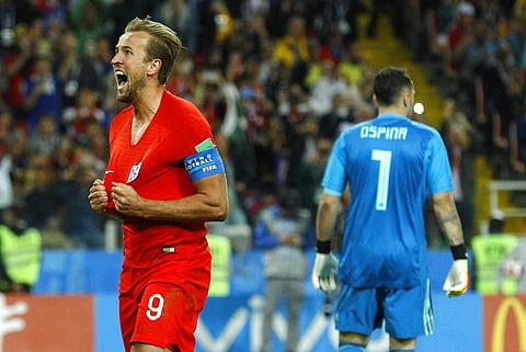 England's Harry Kane celebrates after scoring his side's first goal during the round of 16 match between Colombia and England at the 2018 soccer World Cup in the Spartak Stadium, in Moscow, Russia. (Photo | AP)