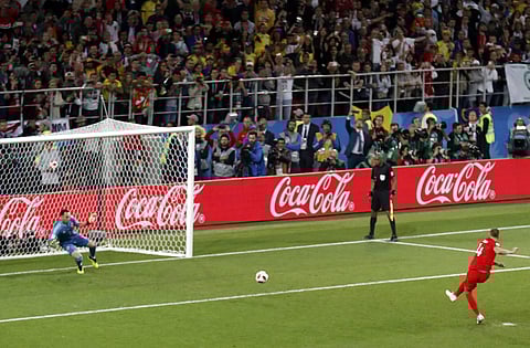 England's Eric Dier scores a penalty shot pastColombia goalkeeper David Ospina during the round of 16 match between Colombia and England at the 2018 soccer World Cup in the Spartak Stadium. (AP)