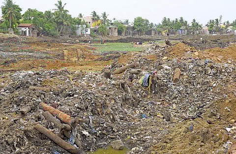 Layers of plastics come to light after residents of Pallavaram begin restoring the Nemilicherry lake, Chennai. ( Photo | Martin Louis/ EPS)