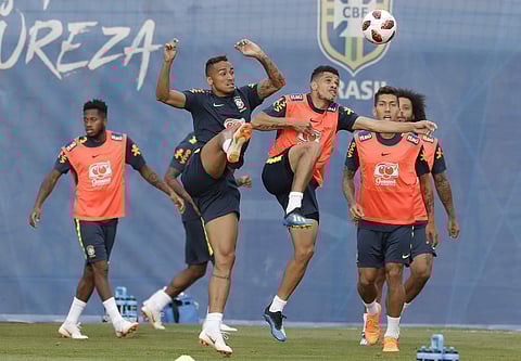 Brazil's Danilo, center left, and teammate Taison, center, practice during a training session, in Sochi, Russia, July 3, 2018. Brazil will face Belgium on July 6 in the quarterfinals for the soccer World Cup. (Photo | AP)