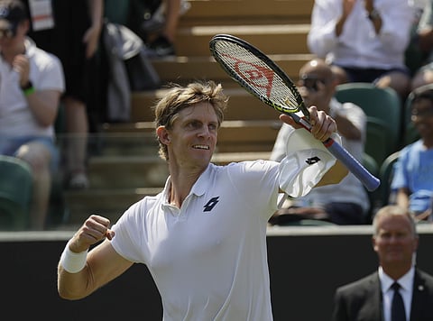 Kevin Anderson celebrates defeating Philipp Kohlschreiber in their men's singles match on the fifth day at the Wimbledon Tennis Championships in London. | AP