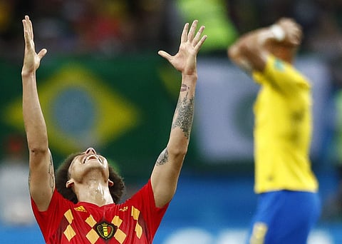 Belgium's Axel Witsel (centre) celebrates after the final whistle as Belgium defeat Brazil in their quarterfinal match between Brazil and Belgium at the 2018 soccer World Cup in the Kazan Arena, in Kazan, Russia, Friday. | AP