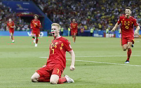 Belgium's Kevin De Bruyne, center, celebrates after scoring his side's second goal during the quarterfinal match between Brazil and Belgium at the 2018 soccer World Cup in the Kazan Arena. | AP