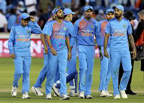 India players look dejected as they leave the field after the IT20 Series cricket Match between England and India, at The SSE SWALEC in Cardiff, Wales, Friday July 6, 2018. | AP