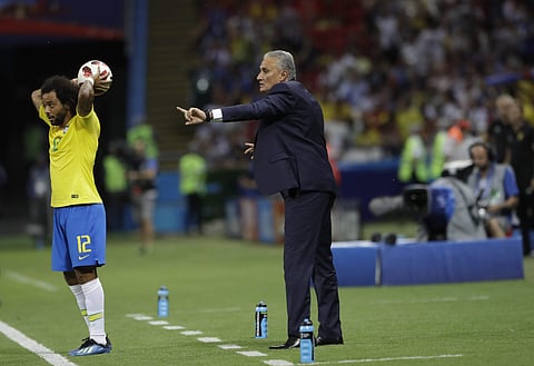Brazil head coach Tite shouts to his players as Brazil's Marcelo prepares for a throw-in during the quarterfinal match between Brazil and Belgium at the 2018 soccer World Cup in the Kazan Arena, in Kazan, Russia, Friday, July 6, 2018. | AP