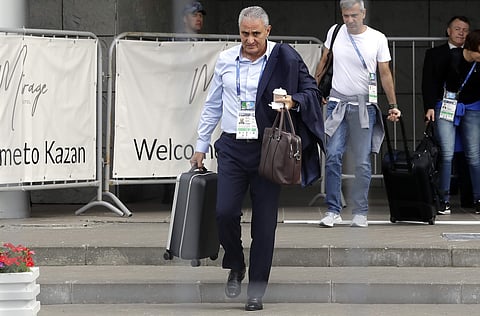 Brazil head coach Tite leaves the hotel to board a bus in his way to the airport Airport in Kazan, Russia.(AP)