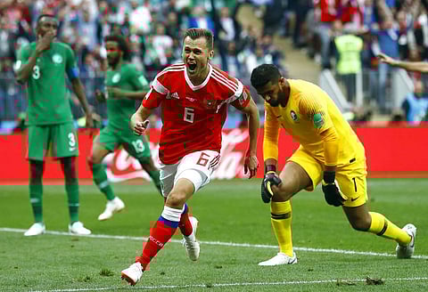 EXHILARATING KICK-OFF MATCH: Host nation Russia thrashed Saudi Arabia 5-0 in the opening match of the World Cup to start their tournament in style in Moscow's Luzhniki Stadium on 14 June. Tey continued their wonder-run until being overpowered by Croatia in penalty shootout. A dampener — a resounding loss to Uruguay in their final group game — was followed by a match that will live long in the memory of the average Russian. Over 120 minutes, Russia held Spain to a 1-1 draw, before trumping them in penalties. Stanislav Cherchesov's men truly made the tournament prosper with their tight defense and giant-slaying instinct. (Photo | AP)