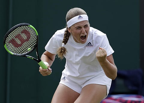 Former French Open champion Jelena Ostapenko sweeps into Wimbledon quarter-finals