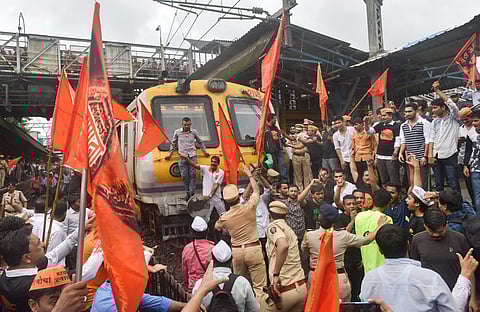 Maratha Kranti Morcha protesters stop a train during their statewide bandh called for reservations in jobs and education in Thane on Wednesday July 25 2018. | (File | PTI)