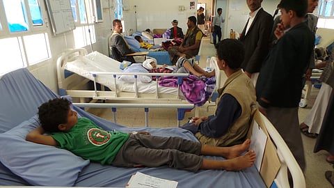 Children who survived an airstrike rest in the hospital in Saada, Yemen