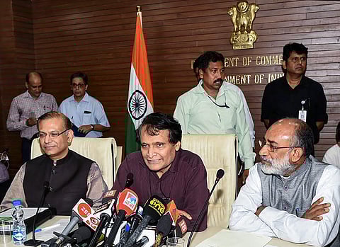 Union Minister for Commerce Industry and Civil Aviation Suresh Prabhakar Prabhu Minister of State for Tourism I/C Alphons Kannanthanam and Minister of State for Civil Aviation Jayant Sinha during a joint press conference in New Delhi on Thursday Aug 09 20