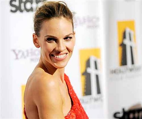 Actress Hilary Swank poses at the 14th Annual Hollywood Awards Gala in Beverly Hills. | AP