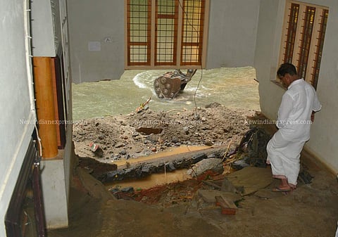 Partially destroyed houses at Kannappankundu in Kozhikode after flood water caused major destructions in the area. (Photo | Manu R Mavelil/EPS)