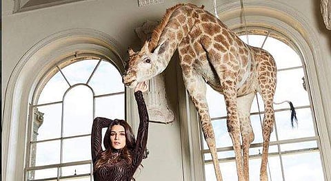 Kriti Sanon with the  taxidermied giraffe. (Photo: Instagram/Cosmoindia)