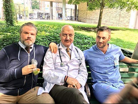 Anupam Kher (centre) with Ty Labine and Ryan Eggold. (Photo | Instagram)