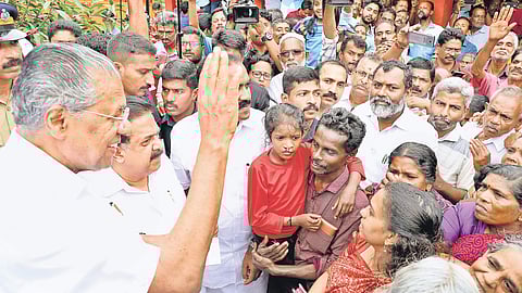 Chief Minister Pinarayi Vijayan with the inmates of the relief camp at Chengamanad school in Kochi on Saturday | Melton Antony