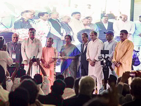 Defence Minister Nirmala Sitharaman and Uttar Pradesh Chief Minister Yogi Adityanath with others at the launch of the defence industrial corridor in Aligarh Uttar Pradesh on Saturday Aug 11 2018. | PTI