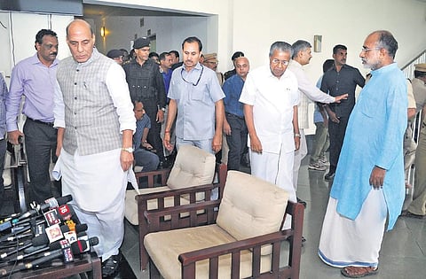 Union Home Minister Rajnath Singh and Chief Minister Pinarayi Vijayan arrive for a press meet at the CIAL Golf Club in Nedumbassery on Sunday | A Sanesh