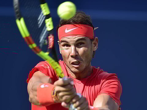 Rafael Nadal, of Spain, returns to Stefanos Tsitsipas, of Greece, during championships men's finals Rogers Cup tennis action in Toronto. (Photo | AP)