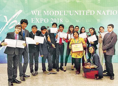 Students of Inventure Academy pose with their certificates at the  WE Model United Nations (WEMUN) Expo 2018