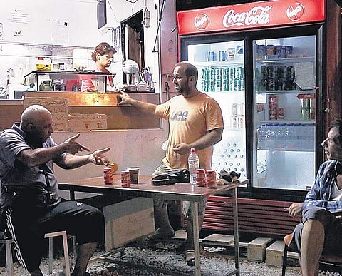 A still from a 2016 film, Imbiss, directed by Chistoph Eder (top) A still from the 2012 film Gabi, directed by Chang Yoon-hyun