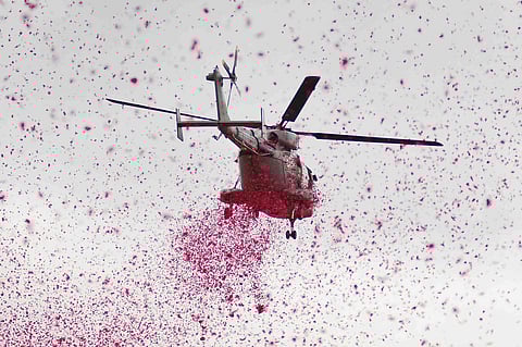 Indian Air Force helicopter shower petals during the 72nd Independence Day in Bengaluru on Wednesday. (Photo | Pushkar V/ EPS)