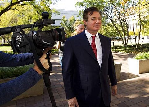 Paul Manafort accompanied by his lawyers, arrives at U.S. Federal Court, in Washington. | AP
