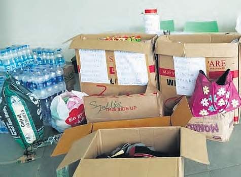 Relief items collected at one of the flood relief collection centres in Hyderabad on Friday | EXPRESS