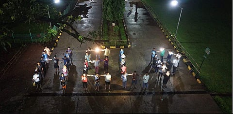 Students of IIT Bombay are seen assembled to form 'HELP' during a solidarity campaign for Kerala (Photo | Facebook/Sabu KT)