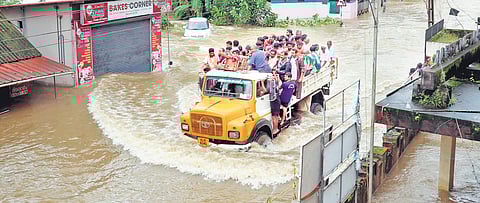 A tipper lorry filled with people rescued from various localities of Maravanthuruthu and Thalayolaparambu panchayats wading through the flood | VISHNU PRATHAP