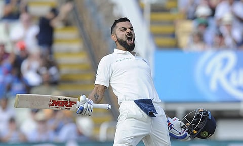 Indian cricket captain Virat Kohli celebrates after scoring a century during the second day of the first test cricket match between England and India at Edgbaston in Birmingham. (Photo | AP)