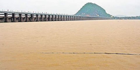 Prakasham barrage is full of water in Vijayawada on Sunday | RVK RAO