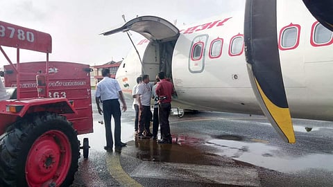 The Alliance Air aircraft which landed in Kochi's naval airbase. (Photo | Suresh Prabhu/Twitter)