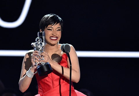 Cardi B speaks onstage at the MTV Video Music Awards at Radio City Music Hall on Monday. | AP