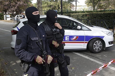 French hooded police officers cordon off the area after a knife attack Thursday, Aug. 23, 2018 in Trappes, west of Paris. (Photo | AP)