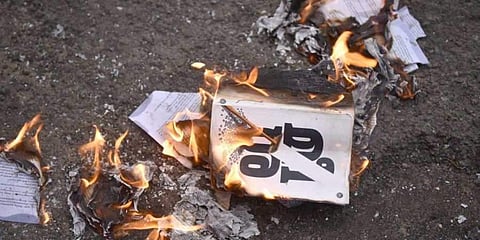 Copies of 'Meesha' being burnt. (Photo | Twitter.com/Suresh BJP)