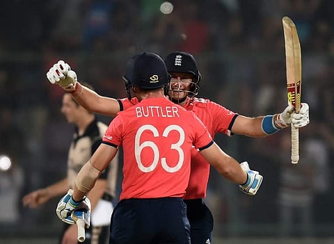 England's Jos Buttler (L) and Joe Root. (Photo | AP)